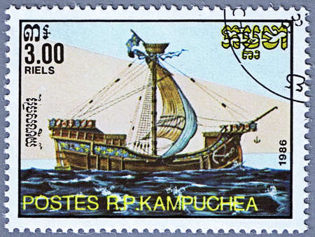 CAMBODIA - CIRCA 1986: A stamp printed in Cambodia shows cog, series is devoted to sailing vessels, circa 1986の写真素材