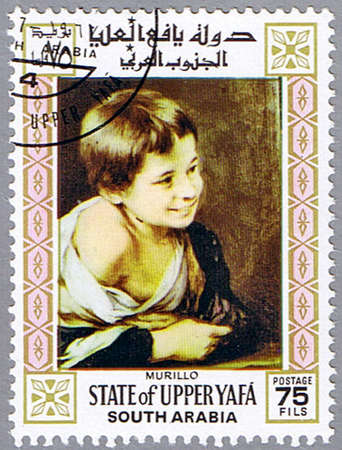 STATE OF UPPER YAFA - CIRCA 1967: A stamp printed in State of Upper Yafa shows painting of Bartolome Esteban Murillo - A Peasant Boy leaning on a Sill, series, circa 1967 の写真素材
