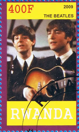 RWANDA - CIRCA 2009: A postage stamp printed in the Republic of Rwanda showing The Beatles, circa 2009 のeditorial素材