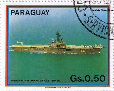 PARAGUAY  CIRCA 1983: stamp printed in Paraguay, shows aircraft carrier, series, circa 1983のeditorial素材