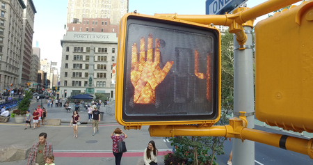 New York City, Circa 2017: Crosswalk countdown signal illuminated to stop people for traffic to pass...