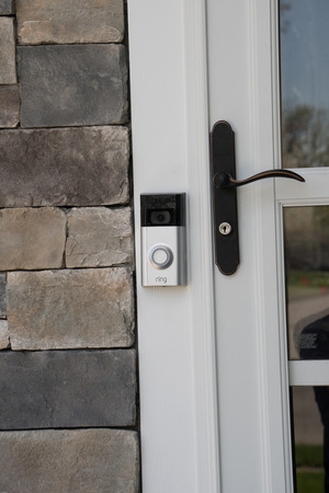 New York, USA - Circa 2018: Ring video doorbell owned by Amazon. manufactures home smart security products allowing homeowners to monitor remotely via smart cell phone app. Illustrative editorialのeditorial素材