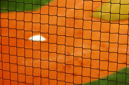 Baseball netting with home plateの写真素材