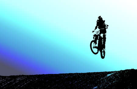 Silhouette of dirt bike rider with a muti color backgound.の写真素材