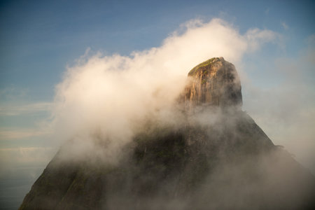 Mountain peak in the clouds. Madeira island, Portugal.の写真素材