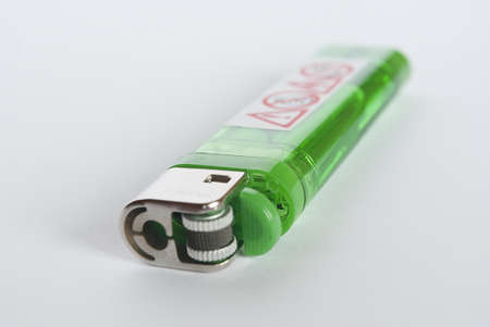 Cigarette lighter with worn signsの写真素材