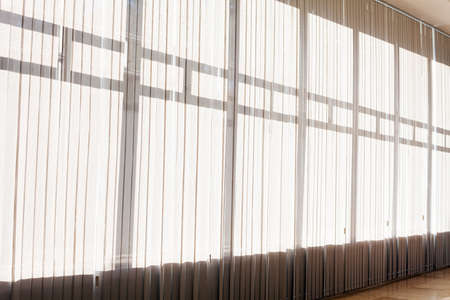 white striped curtains in the interior, note shallow depth of fieldのeditorial素材