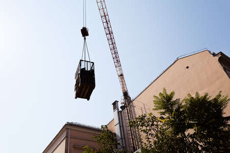 transfer cargo crane on a buildingの写真素材