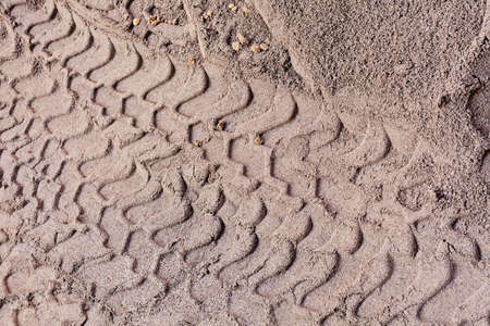 Sand with tire tracksの写真素材