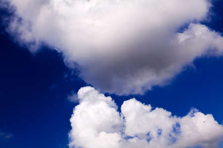 Deep blue sky and white cloudsの写真素材