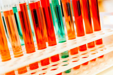 Test tubes with red and green chemicals