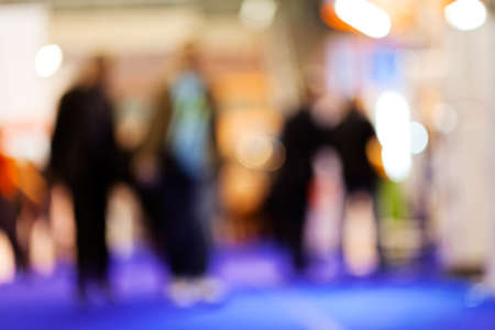 Group of people walking down the corridor in business building; blurred 100%の写真素材