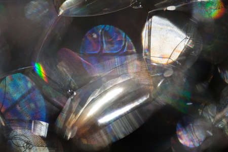 the reflection of light through  bubbles  of soapsuds, for blurred background