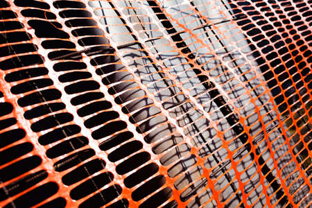 red plastic safety net for construction siteの写真素材