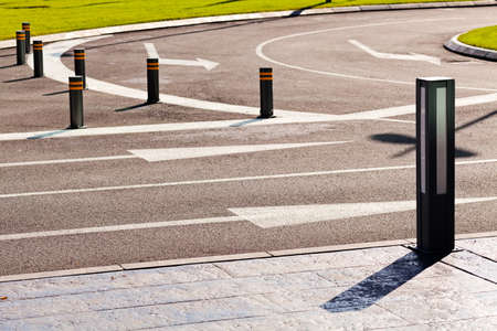 Directional arrows on the asphalt road