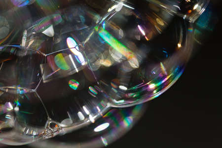 abstraction of soap bubbles on a dark background, for blurred background
