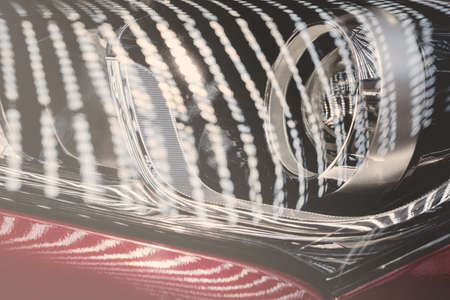 type headlights of the vehicle, note shallow depth of field