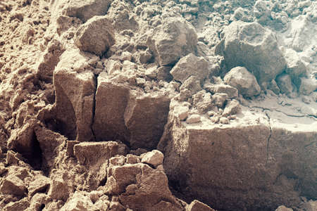 Construction sand near the site, note shallow depth of field