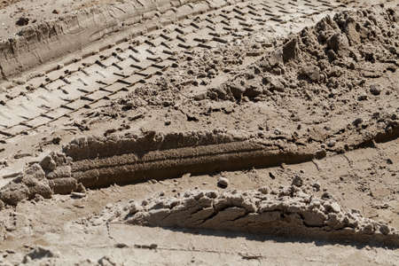 tire tracks in the sand, note shallow depth of field