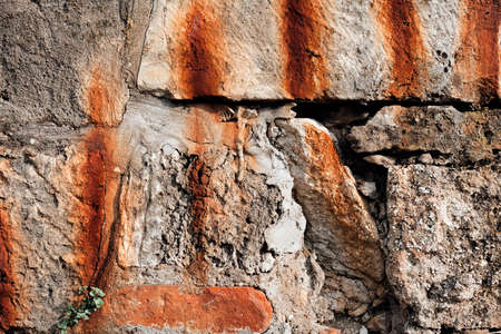 abstract old stone wall with old graffiti, note shallow depth of fieldの写真素材