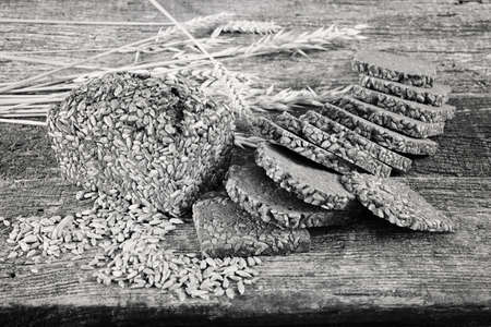 Decoration with slices of rye bread on a wooden board