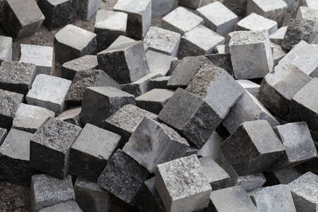 granite cubes in a pile, note shallow depth of fieldの写真素材