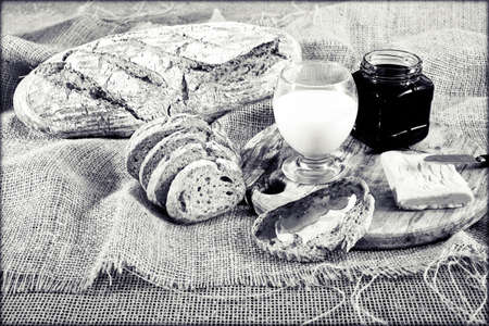 Breakfast with butter and honey on the  linen clothの写真素材