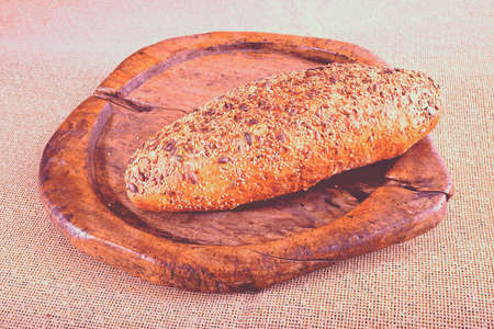 bread with seeds on the wooden board