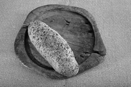 bread with seeds on the wooden board