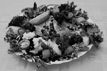 beef steak decorated with lots of vegetablesの写真素材