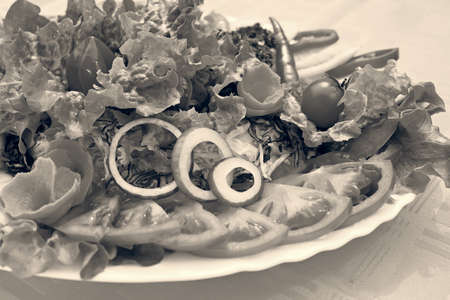 mixed salad known as the "garden" on the big plateの写真素材