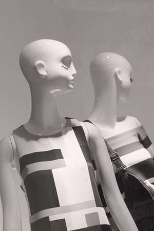 mannequins in a store window, note shallow depth of fieldの写真素材