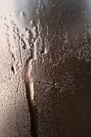 frost patterns on glass, note shallow depth of fieldの写真素材