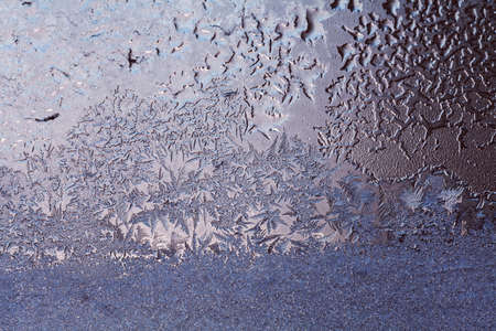 frost patterns on glass, note shallow depth of fieldの写真素材