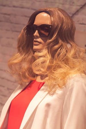 head of the doll with long hair, note shallow depth of fieldの写真素材