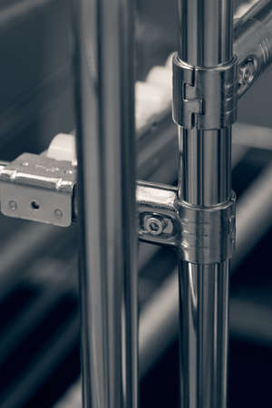 Parts of metal construction, note shallow depth of fieldの写真素材