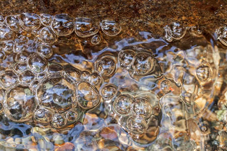 abstract surface of a mountain stream, note shallow depth of field