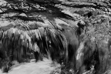 stone under the mountain water, note shallow depth of field