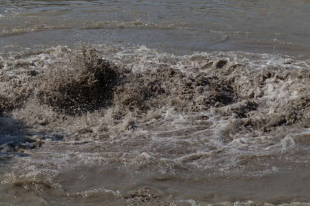 sand and mud in industrial water, note shallow depth of field