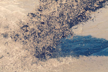 sand and mud in industrial water, note shallow depth of fieldの写真素材
