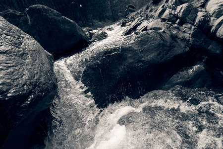 abstraction waterfall in a mountain stream, note shallow depth of fieldの写真素材