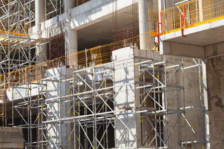 construction site with equipment and workers
