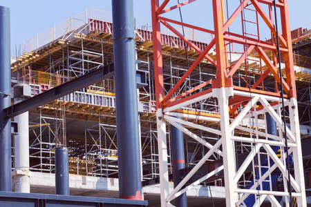 construction site with equipment and workers