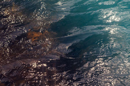 clear mountain running water, note shallow depth of field