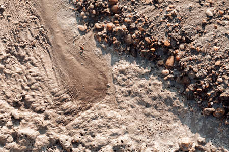 sand and gravel in construction after rainの写真素材