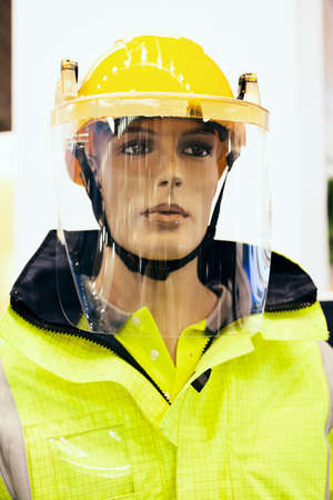 protective suits and masks in constructionの写真素材