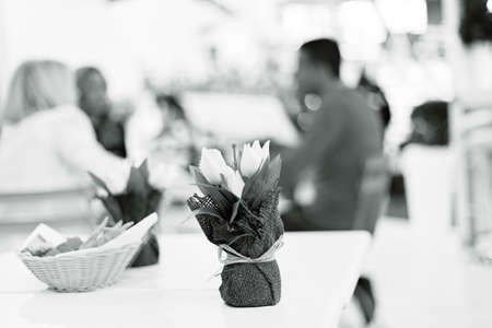Decoration on the table with the silhouettes in the background, note shallow depth of fieldの写真素材