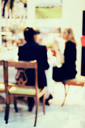 shadows and silhouettes two women , for blurred backgroundの写真素材