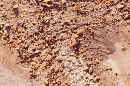 sand and gravel in construction after rainの写真素材