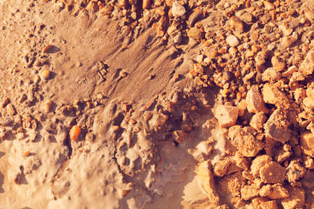 sand and gravel in construction after rainの写真素材